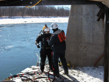 Diver preparing to enter icy water